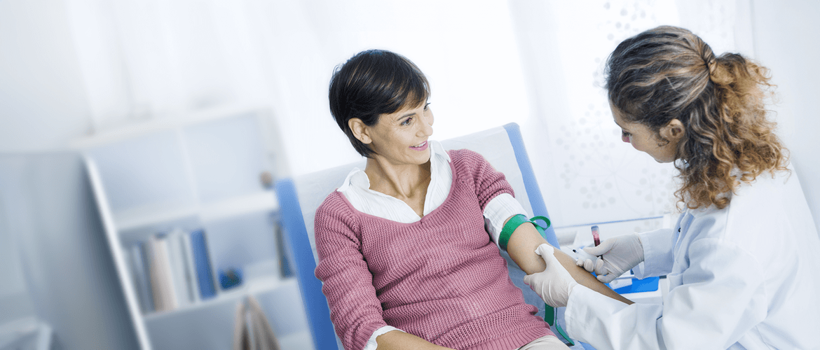 A women has a blood test with a female nurse to represent labelling solutions at Awanui Labs