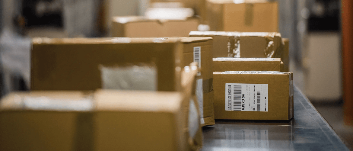 Boxes on warehouse bench with labels