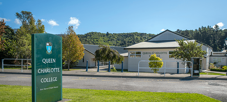 Queen Charlotte College exterior building with signage in foreground as part of Managed Print Services from Brother 