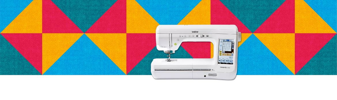 quilting machine on a multicoloured pattern background